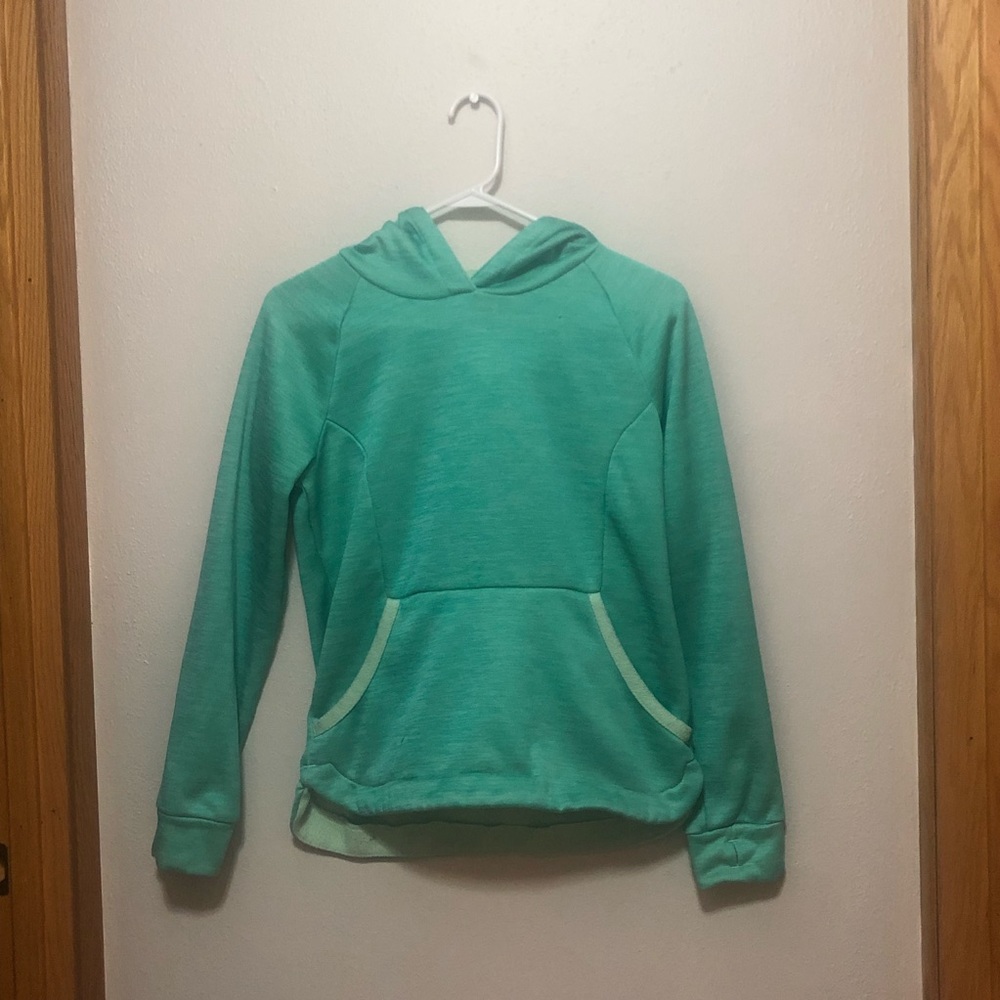 A very soft/comfy green sweatshirt that is extra large in girls.